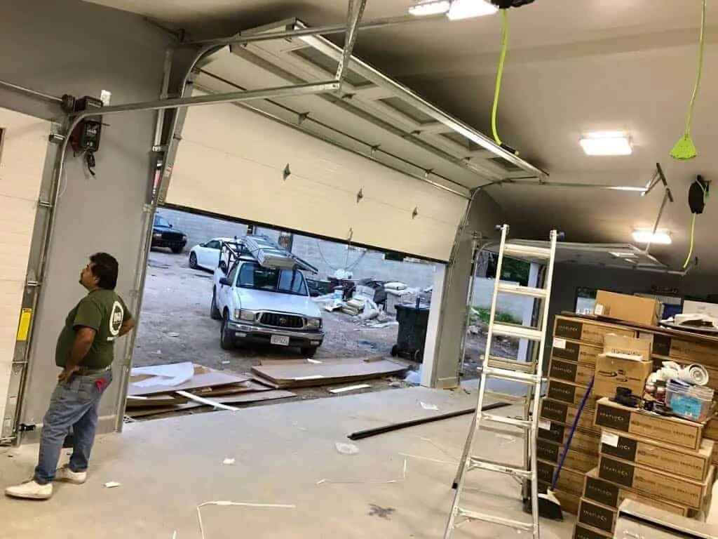 Garage Door Panel and Track Inspection During Repair - Handyman Group SFL