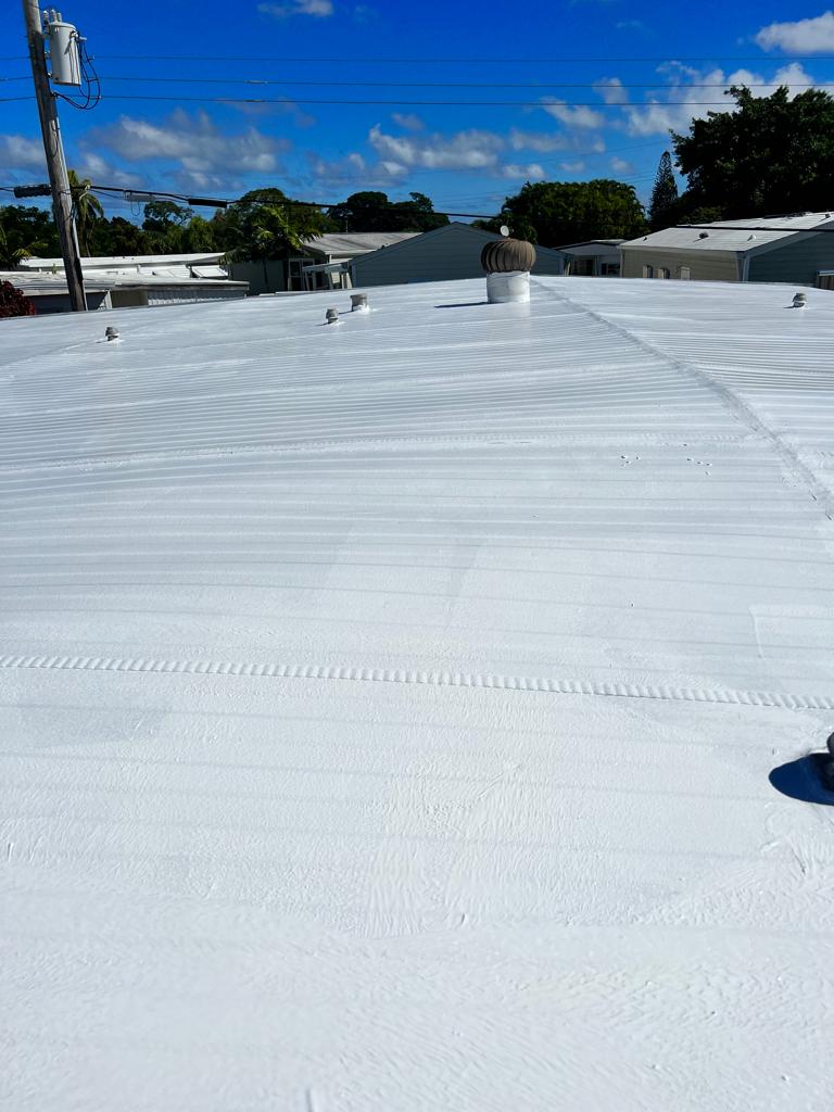 Freshly coated white flat roof on a South Florida home - Handyman Group SFL