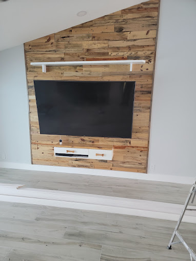 Reclaimed Wood Accent Wall with Mounted TV - Handyman Group SFL