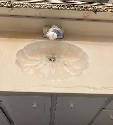 Dated cultured marble sink and vanity top before bathroom replacement - Handyman Group SFL